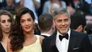“Aku sangat bahagia lantaran akan segera menikah dan itu (kehamilan) sepertinya akan menjadi rencana kami selanjutnya,” tutur George Clooney beberapa waktu lalu. (AFP/ALBERTO PIZZOLI)