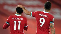 Roberto Firmino. Gelandang serang Liverpool ini mengenakan nomor punggung 11 di awal kedatangannya pada 2015/2016 hingga 2016/2017. Usai kedatangan Mohamed Salah pada 2017/2018 ia memberikan nomor tersebut kepada Salah dan mengganti nomornya menjadi 9 hingga kini. (Foto: AFP/Pool/Peter Powell)