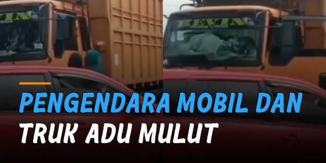 VIDEO: Tidak Mau Saling Kalah, Pengendara Mobil dan Truk Adu Mulut di Jalan