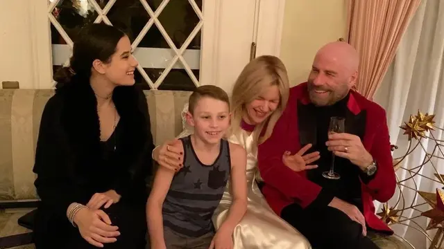 [Fimela] John Travolta dan Kelly Preston