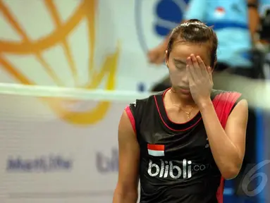 Bellaetrix Manuputty gagal mewujudkan target mencapai babak 8 besar BCA Indonesia Open Superseries Premier 2014, Jakarta, Rabu (18/6/2014) (Liputan6.com/Miftahul Hayat) 