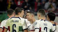 Timnas Portugal menang 6-0 atas Luksemburg pada matchday kedua Grup J Kualifikasi Euro 2024 di Luksemburg Stadium, Senin (27/3/2023) dini hari WIB. (AP/Olivier Matthys)
