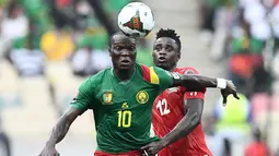 Vincent Aboubakar merupakan pemain paling senior di Timnas Kamerun untuk Piala Dunia 2022. Ia tercatat telah mengoleksi 88 caps sejauh ini. Aboubakar pernah membawa skuad berjuluk Lions Indomptables memenangi Piala Afrika pada 2017. Pemain yang berposisi sebagai penyerang ini menghabiskan enam tahun bersama FC Porto sebelum pindah ke Besiktas. Kini, ia berseragam klub Arab Saudi, Al-Nassr. (AFP/Charly Triballeau)