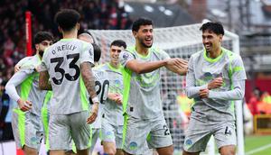 Para pemain Manchester City merayakan gol yang dicetak oleh Tijjani Reijnders ke gawang Nottingham Forest pada laga pekan ke-18 Premier League di Stadion The City Ground, Sabtu (27/12/2025). (Barrington Coombs/PA via AP)