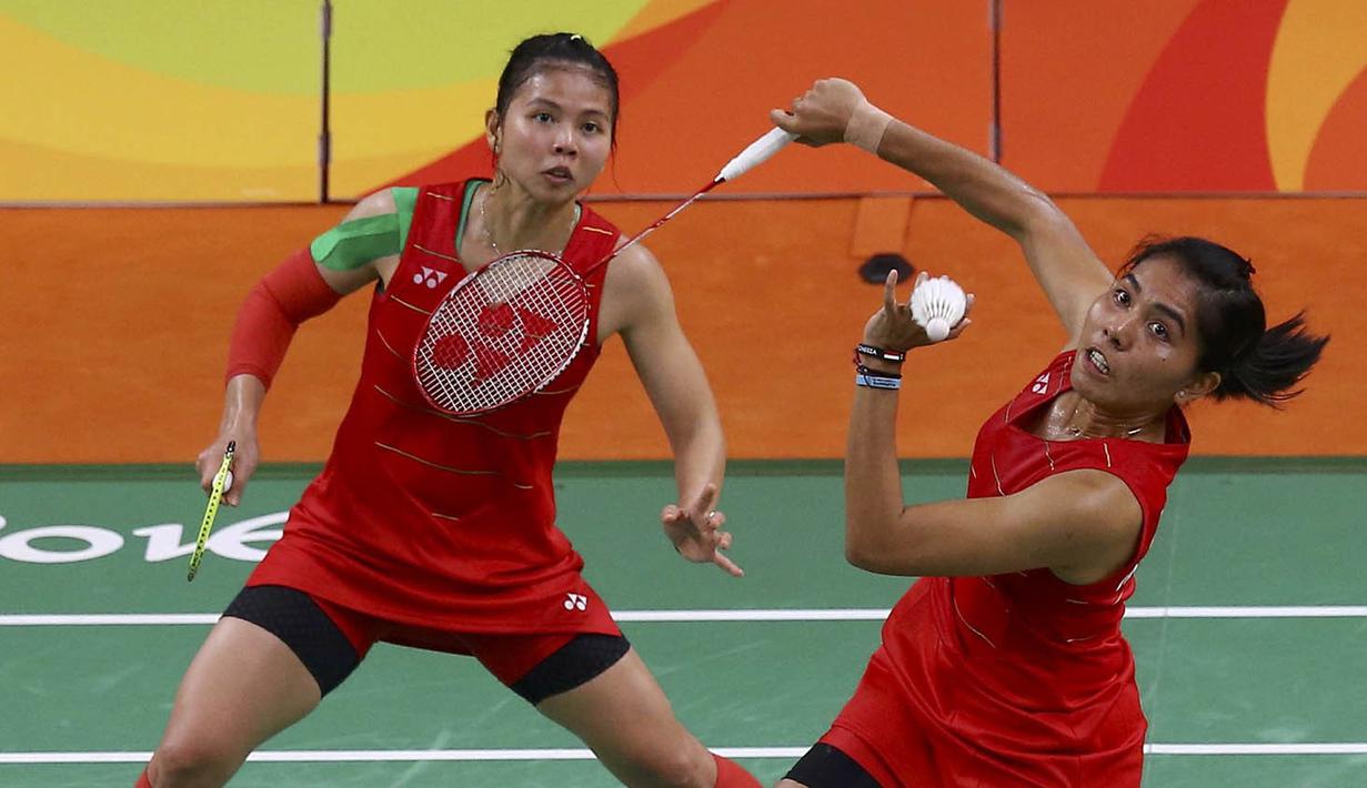 Pasangan Indonesia, Greysia Polii/Nitya Krishinda Maheswari, kalah dari wakil China, Tang Yuanting/Yu Yang, pada perempat final Olimpiade 2016 di Rio de Janeiro, Brasil, Senin (14/8/2016). (Reuters/Marcelo Del Pozo)