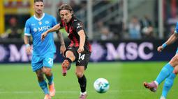 Tambahan tiga poin ini menjadikan AC Milan pemuncak klasemen sementara Serie A dengan raihan 12 poin. (AP Photo/Luca Bruno)