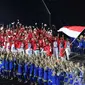 Kontingen Indonesia melintas saat pembukaan Asian Games 2018 di Stadion Utama Gelora Bung Karno (SUGBK), Jakarta, Sabtu (18/8). Asian Games 2018 diikuti 45 negara. (Merdeka.com/Imam Buhori)