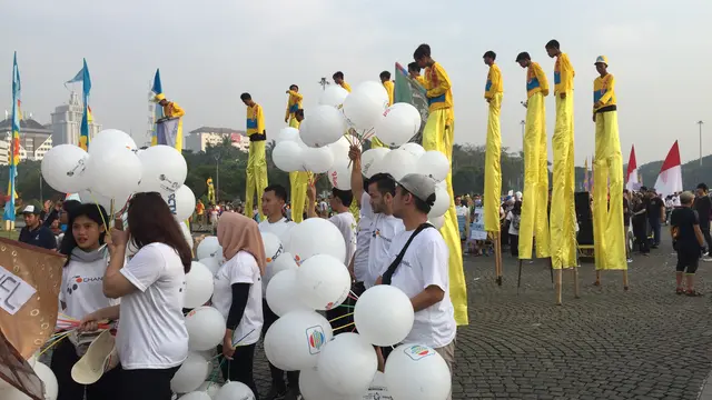 Pesaerta parade Asian Games yang digelar di Lapangan Silang Monas (Liputan6.com/Devira Prastiwi)