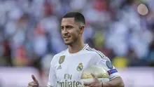 Eden Hazard diperkenalkan kepada media dan publik sebagai pemain anyar Real Madrid di Santiago Bernabeu, Jumat (13/6/2019).(AP Photo/Manu Fernandez)
