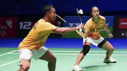 Rehan Naufal Kusharjanto/Lisa Ayu Kusumawati berhasil menyudahi permainan Kyohei Yamashita/Naru Shinoya dalam waktu 76 menit. (AP/PA/Zac Goodwin)