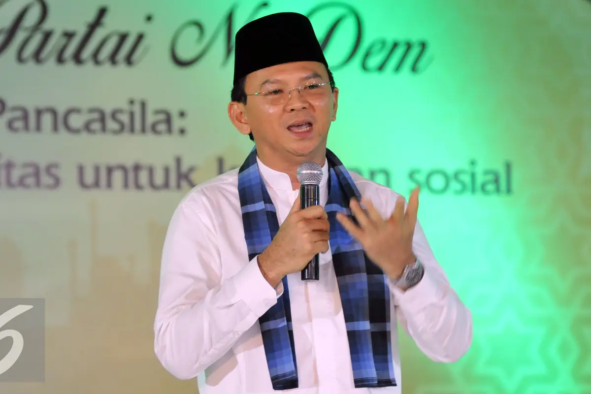 20160609- Gaya Ahok Saat Buka Puasa Bareng Partai Nasdem-Jakarta- Johan Tallo