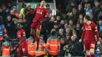 Gelandang Liverpool, Fabinho, berselebrasi setelah mencetak gol pembuka untuk timnya ke gawang Manchester City dalam pertandingan pekan ke-12 Liga Inggris 2019-2020 di Anfield, Minggu (10/11/2019). Liverpool menghabisi Man City dengan skor cukup telak 3-1. (AP/Jon Super)