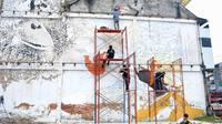 Anak muda di Kota Medan kampanye penyelamatan alam dengan mural dalam memperingati Hari Hutan Sedunia 2022 (Ist)