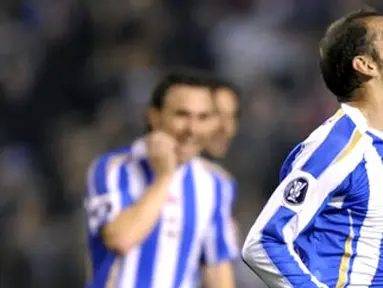 Deportivo La Coruna's Alberto Lopo celebrates after scoring against Feyenoord during their UEFA Cup group H match at Riazor Stadium in Coruna, on November 27, 2008. AFP PHOTO/MIGUEL RIOPA