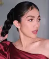 Ussy Sulistiawaty baru saja menggelar acara launching brand parfumnya. Di momen ini, Ussy memilih tampilan penuh pesona mengenakan mini dress merah. [Foto: Instagram/ussypratama]