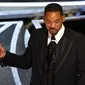 Will Smith jadi Aktor Tebaik dalam film King Richard dalam ajang Piala Oscar 2022 (dok. Robyn Beck / AFP)