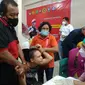 Badan Intelijen Indonesia Daerah (Binda) Kepri, menggelar vaksinasi Covid-19 kepada 1.340 Anak Berkebutuhan Khusus (ABK) dan disabilitas sekaligus pelajar di SLB di Provinsi Kepri. (Liputan6.com/ Ajang Nurdin)