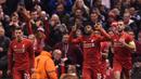 Pemain Liverpool merayakan gol yang dicetak oleh Daniel Sturridge ke gawang Manchester United pada laga leg pertama babak 16 besar Liga Europa di Stadion Anfield, Inggris, Kamis (10/3/2016). Liverpool berhasil menang 2-0 dari MU. (AFP/Paul Ellis)