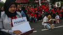 Selain itu, pengunjuk rasa juga mendesak mencabut Undang-Undang Omnibuslaw UU Nomor 6 Tahun 2023 tentang Cipta Kerja. (Liputan6.com/Angga Yuniar)