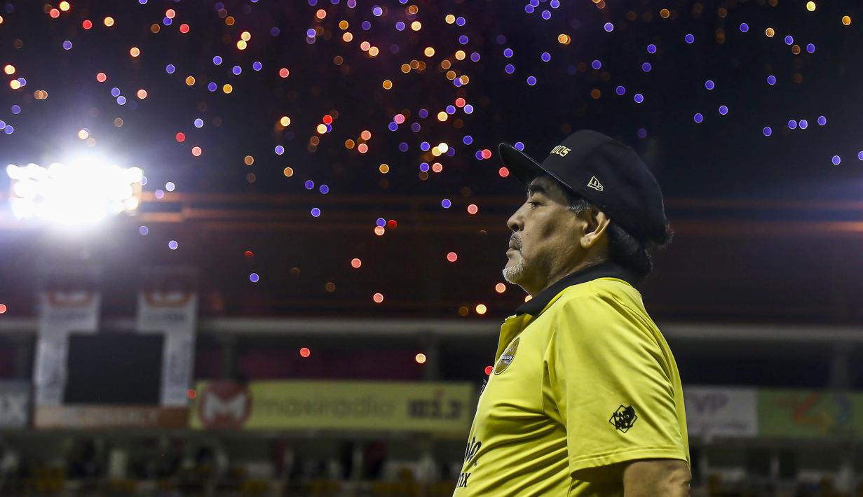 Keberhasilan Maradona mengangkat timnya menjadi juara saat menjadi pemain belum bisa dilakukan saat dia menjadi pelatih di Dorados. ( AFP/Rashide Frias )
