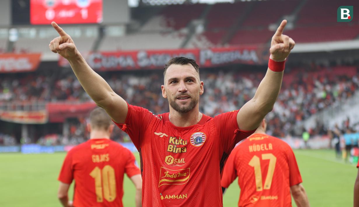 <p>Selebrasi pemain Persija Jakarta, Marko Simic setelah mencetak gol pertama timnya ke gawang PSIS Semarang pada laga pekan ke-34 BRI Liga 1 2023/2024 di Stadion Utama Gelora Bung Karno (SUGBK), Senayan, Jakarta, Selasa (30/4/2024). (Bola.com/Abdul Aziz)</p>