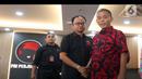 Politikus PDIP, Masinton Pasaribu, menjelaskan kedatangan ke kantor DPD PDIP untuk bersilahturahmi. (Liputan6.com/Herman Zakharia)