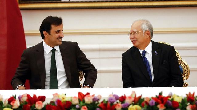 Emir Qatar Sheikh Tamim bin Hamad Al Thani dan Perdana Menteri Malaysia Najib Razak