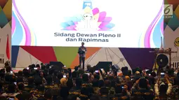 Presiden Joko Widodo atau Jokowi berbicara dalam Sidang Dewan Pleno II dan Rapimnas HIPMI di Tangerang, Banten, Rabu (7/3). Rapimnas ini dihadiri lebih dari 2.000 peserta dari 34 provinsi di Indonesia. (Liputan6.com/Angga Yuniar)