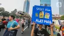 Pawai Bebas Plastik sebagai media kampanye mengurangi sampah plastik yang semakin menjadi ancaman nyata bagi lingkungan. (Liputan6.com/Faizal Fanani)