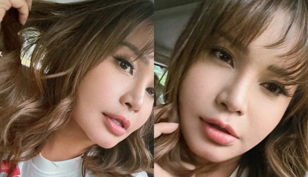 Rambut nya tersebut pun juga dibiarkan terurai dengan gaya layering.  [@itsrossa910]