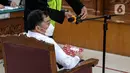 Terdakwa kasus merintangi penyidikan atau 'obstruction of justice' pembunuhan berencana terhadap Brigadir Nopriansyah Yosua Hutabarat (Brigadir J), Arif Rachman Arifin bersiap menjalani sidang perdana di Pengadilan Negeri Jakarta Selatan, Rabu (19/10/2022). Sidang tersebut beragendakan pembacaan dakwaan terhadap Arif yang merupakan mantan Wakaden B Ropaminal Divpropam Polri. (Liputan6.com/Faizal Fanani)