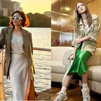 Tampil kece dengan padu padan rok satin dan kemeja oversize bermotif nuansa hijau. Lengkapi gaya dengan sneakers putih. [@lunamaya]