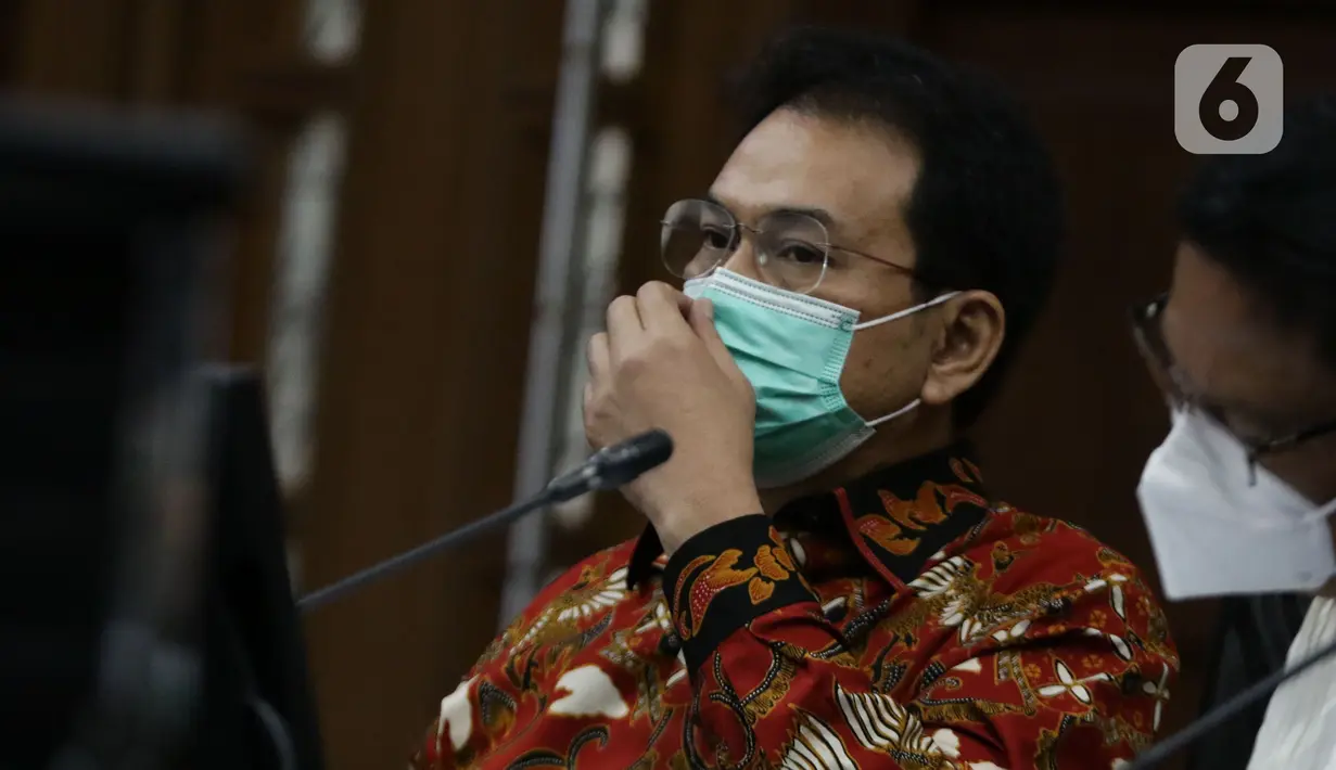 Mantan Wakil Ketua DPR Azis Syamsuddin saat mengikuti sidang lanjutan dugaan suap penanganan perkara korupsi di Lampung Tengah, Pengadilan Tipikor Jakarta, Senin (13/12/2021). Sidang bergaendakan pemeriksaan keterangan saksi-saksi. (Liputan6.com/Helmi Fithriansyah)