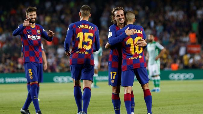 Barcelona meraih kemenangan 5-2 atas Real Betis pada laga pekan kedua La Liga Spanyol di Camp Nou, Minggu (26/8/2019) malam WIB. (AP Photo/Joan Monfort)