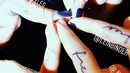 "Tim yang membuat tato bereng bersama selamanya," tulis Demi di akun Instagramnya. (instagram/ddlovato)
