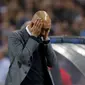 Bayern Munich's coach Pep Guardiola reacts during their Champions League quarterfinal first leg soccer match against Porto at Dragao stadium in Porto April 15, 2015. REUTERS/Miguel Vidal