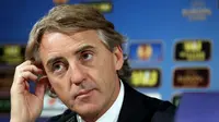 Inter Milan's Italian coach Roberto Mancini addresses a press conference after the UEFA Europa League first-leg, Round of 16 football match VfL Wolfsburg vs FC Internazionale Milano in Wolfsburg, northern Germany on March 12, 2015. Wolfsburg won the match