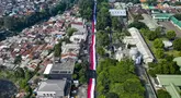 Foto udara ini memperlihatkan sekitar 3.500 orang yang berpartisipasi dalam pawai membawa bendera Indonesia sepanjang 500 meter di Jalan Sudirman Bogor, Jawa Barat, Minggu,  9 Agustus 2026. (AFP/ Aditya Aji)