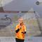 Woro Srihastuti Sulistyaningrum, Deputi Bidang Koordinasi Peningkatan Kualitas Keluarga dan Kependudukan Kemenko PMK, memberikan sambutan pada puncak acara Cycling Tour Kampanye "16 Days of Activism: Unite to End Digital Violence against All Women and Girls" di Kuningan, Jakarta pada Sabtu (6/12/2025). Foto: European Union (Uni Eropa) - Indonesia Cooperation Facility (EUICF).