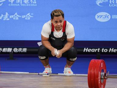 Atlet angkat besi senior Indonesia, Eko Yuli Irawan gagal menyumbangkan medali di ajang Asian Games 2022 Hangzhou, China. (Dok. NOC Indonesia)