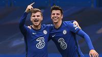 Striker Chelsea, Timo Werner, merayakan gol yang dicetaknya ke gawang Southampton pada laga lanjutan Liga Inggris di Stamford Brigde, Sabtu (17/10/2020) malam WIB. Chelsea bermain imbang 3-3 atas Southampton. (AFP/Mike Hewitt/pool)