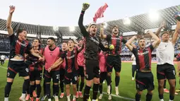 Dibantu kemenangan 2-1 Atalanta atas AS Roma, Senin (13/5/2024), Bologna pun berpesta. Bologna dipastikan finis di zona Liga Champions dengan dua laga tersisa. (Alessandro Garofalo/LaPresse via AP)
