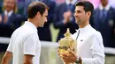 Di tahun 2019 Novak Djokovic berhasil menjadi juara dengan lagi-lagi mengalahkan Roger Federer di partai final Wimbledon. Petenis asa Serbia itu menang dengan skor 7-6(5) 1-6 7-6(4) 4-6 13-12(3). (AFP/Daniel Leal)