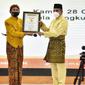 Rekor MURI diraih Pemprov Sumut untuk kategori Peserta Terbanyak Mengikuti Uji Kemahiran Berbahasa Indonesia (UKBI) dan Peserta UKBI Terbanyak Yang Menggunakan Pakaian Adat