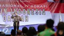 Presiden Joko Widodo memberikan kata sambutan dalam Musyawarah Nasional IV Adkasi di Jakarta, Kamis (17/12). Musyawarah nasional ini bertema 'Membangun Indonesia Dari Daerah' dengan dihadiri DPRD Kabupaten seluruh Indonesia. (Liputan6.com/Faisal R Syam)