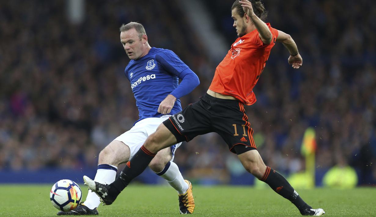 Pindah ke Everton kemungkinan bisa memacu motivasi Wayne Rooney untuk menjadi top scorer pada musim 2017-2018. Bersama Manchester United musim 2016-2017 Rooney bemain sebanyak 39 kali dan mencetak 8 gol. (Barrington Coombs/PA via AP)