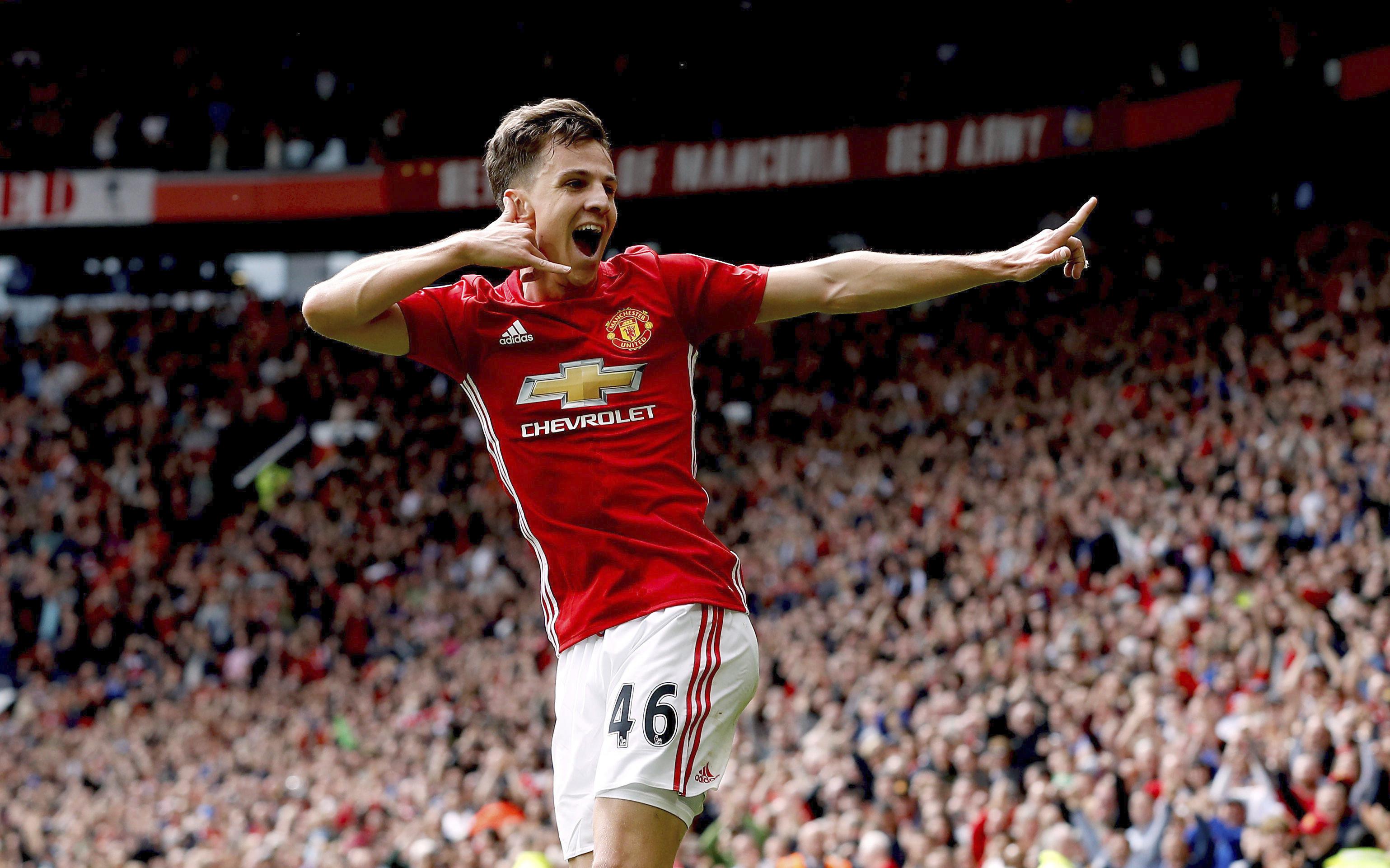 Selebrasi pemain muda Manchester United, Josh Harrop usai mencetak gol ke gawang Crystal Palace. (Martin Rickett/PA via AP)