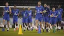 <p>Para Pemain Prancis melakukan pemanasan selama sesi latihan di stadion Jassim Bin Hamad di Doha, Qatar, Senin, 12 Desember 2022. Prancis akan bermain melawan Maroko dalam pertandingan semifinal Piala Dunia 2022 di Stadion Al Bayt, Al Khor, Kamis (15/12/2022) pukul 02.00 WIB. (AP Photo/Christophe Ena)</p>