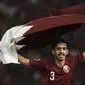Pemain Qatar, Ahmed Albakheet, merayakan kemenagan atas Thailand pada laga AFC U-19 Championship di SUGBK, Jakarta, Minggu (28/10). Qatar menang 8-3 atas Thailand. (Bola.com/Vitalis Yogi Trisna)