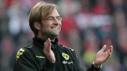 Juergen Klopp merupakan salah satu pelatih legendaris di Dortmund. Berkat sejumlah prestasi yang pernah dirinya raih selama tujuh musim menukangi Die Borussen. (AFP/Daniel Roland)